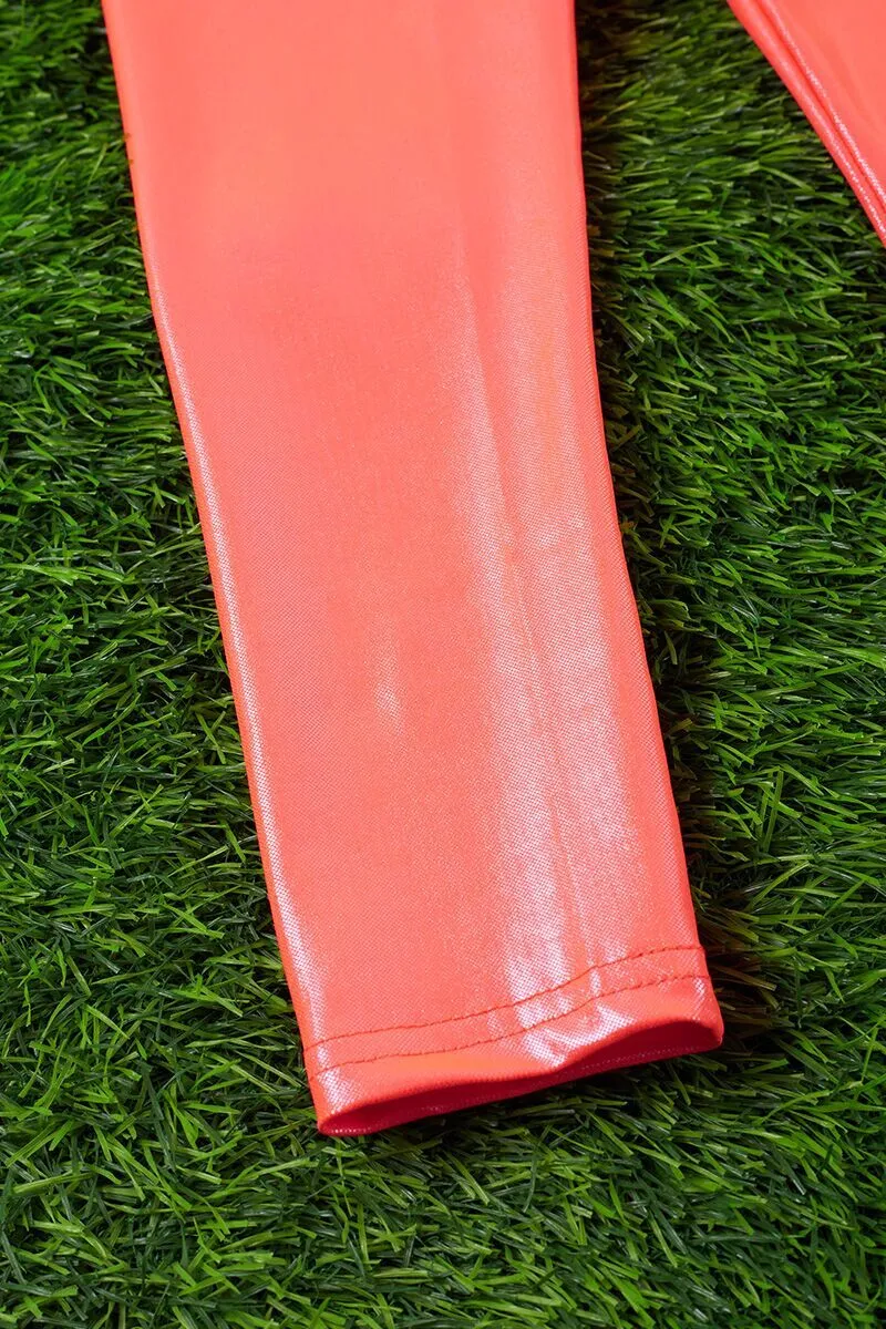 Neon orange satin silk stretchy leggings. PNG25153076 WEN